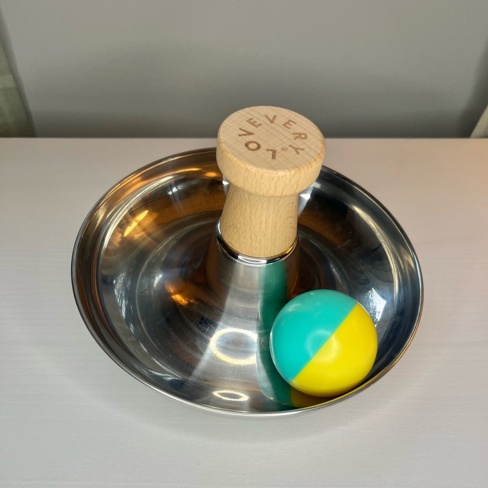 Lovevery Stainless Steel Tip & Turn Spinning Montessori Toy with Rattle Ball